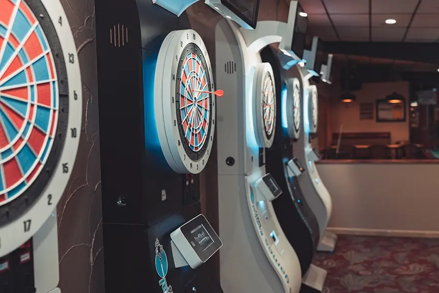 Row of electronic dart machines at St. Clair Bowl